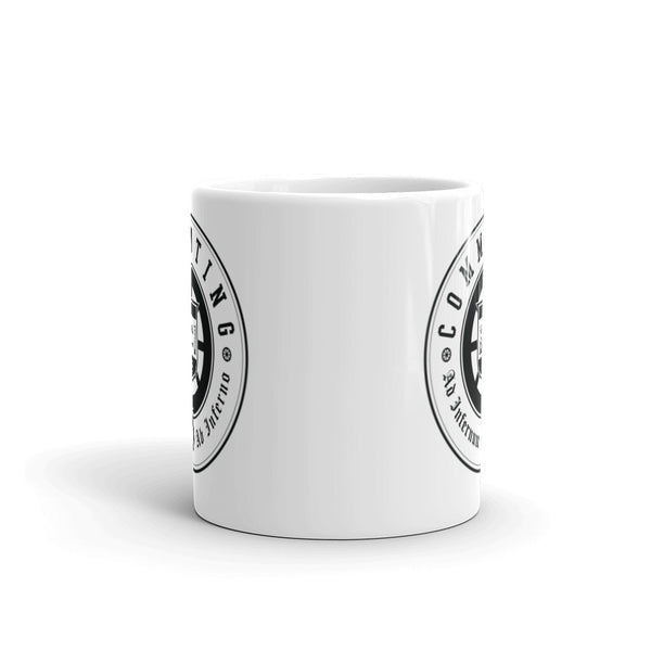 An alternate view of the Commuting seal on a white mug