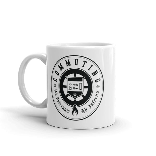 An alternate view of the Commuting seal on a white mug